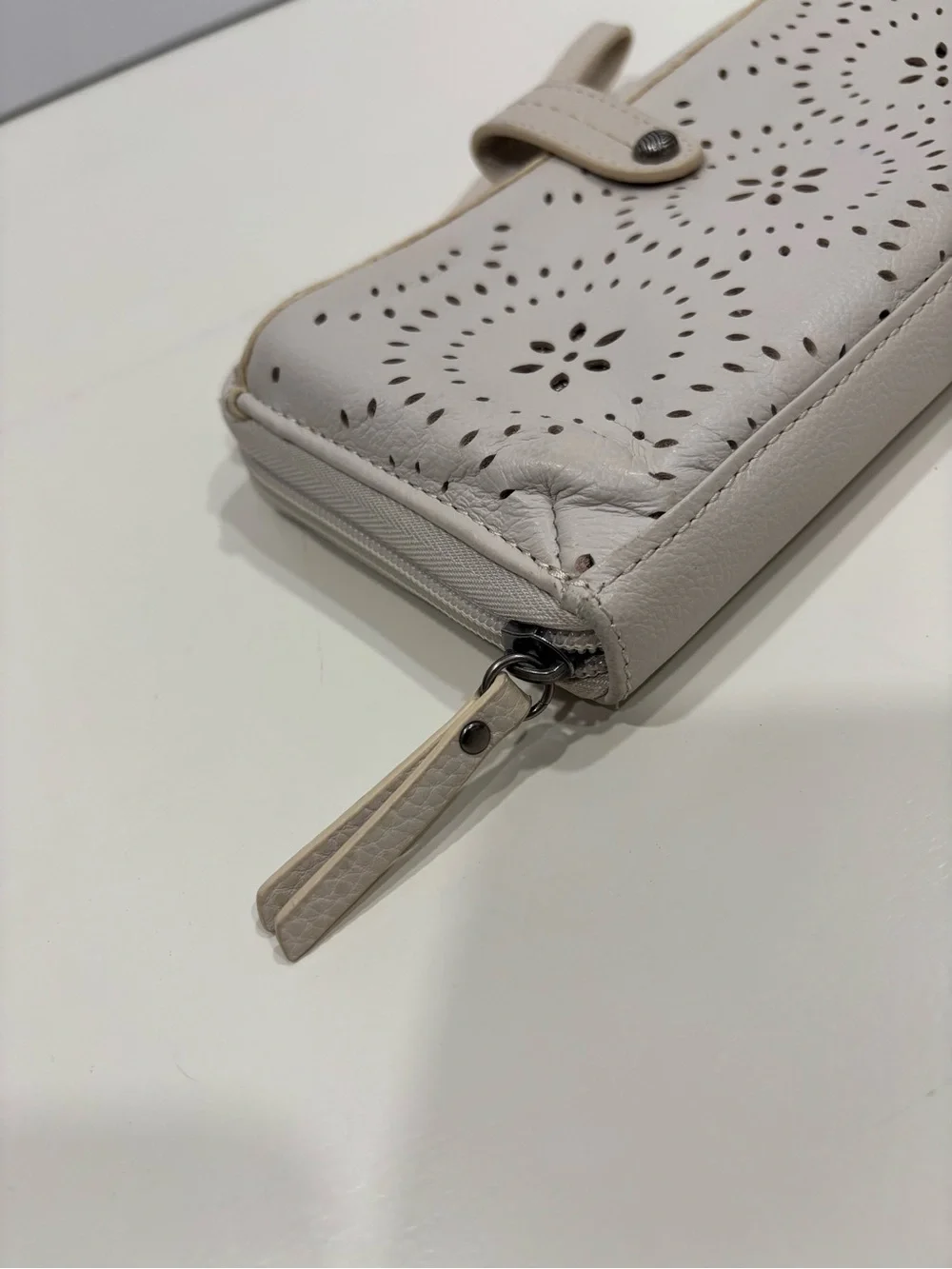 The Sak Light Cream Wristlet Clutch